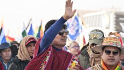 Former Bolivian President Evo Morales waves to supporters during a rally against President Luis Arce in El Alto, Bolivia, September 23, 2024. Clashes between supporters of President Luis Arce and indigenous leader Evo Morales on September 22 near La Paz, left eight people injured, to which President Arce warned that he "will not allow" a "civil war" in Bolivia. (Photo by AIZAR RALDES / AFP) (Photo by AIZAR RALDES/AFP via Getty Images)