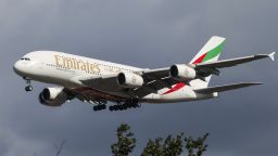 Emirates Airbus A380 double decker passenger aircraft spotted flying in the air between the blue sky and the clouds, on final approach for landing on the runway of London Heathrow Airport LHR in the United Kingdom. The superjumbo wide body airplane has the registration tail number A6-EUI and is powered by 4x Engine Alliance EA GP7270 jet engines. The long haul airliner is arriving from Dubai. Emirates EK is one of the flag carrier airline in the United Arab Emirates UAE owned by the Government of Dubai Investment Corporation of Dubai. The airline is the 4th largest in the world with main hub Dubai International Airport DXB, with a fleet of 249 planes. London, UK on September 2024 (Photo by Nicolas Economou/NurPhoto via Getty Images)