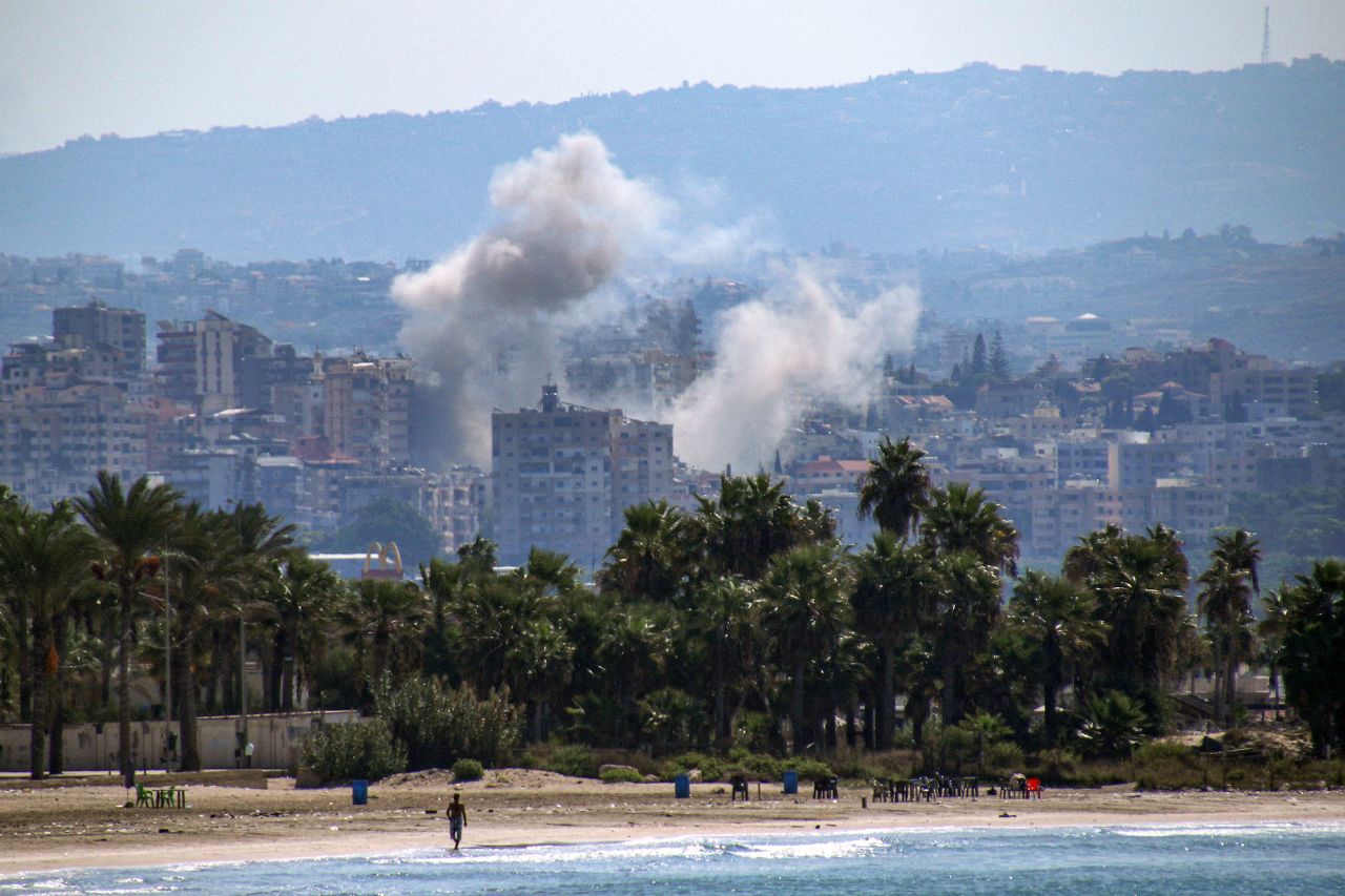 A cloud of smoke erupts during Israeli air strikes on a village south of Tyre in southern Lebanon on Wednesday.