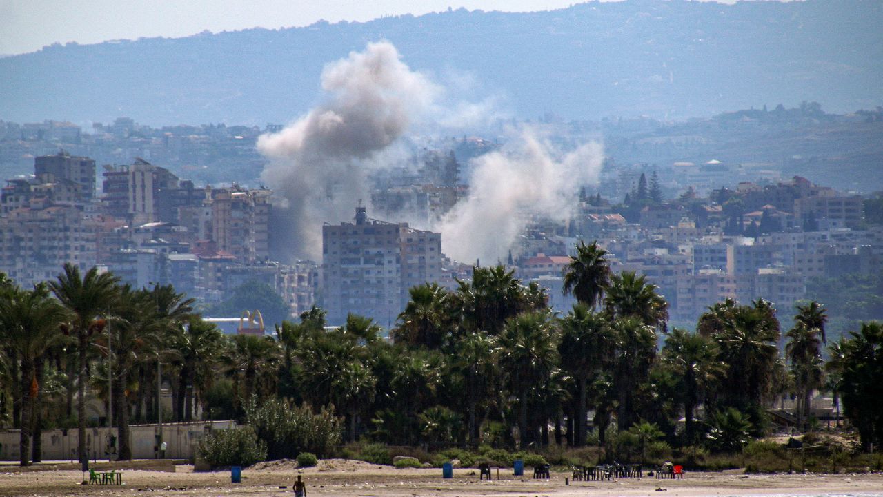 A cloud of smoke erupts during Israeli air strikes in southern Lebanon on September 25.