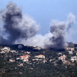 A cloud of smoke erupts during an Israeli air strike on the village of Sujud in southern Lebanon on September 25, 2024. Israel announced dozens of new air strikes on Hezbollah strongholds in Lebanon on September 24, a day after 492 people, including 35 children, were killed in the deadliest bombardment since a devastating war in 2006. (Photo by Rabih DAHER / AFP) (Photo by RABIH DAHER/AFP via Getty Images)