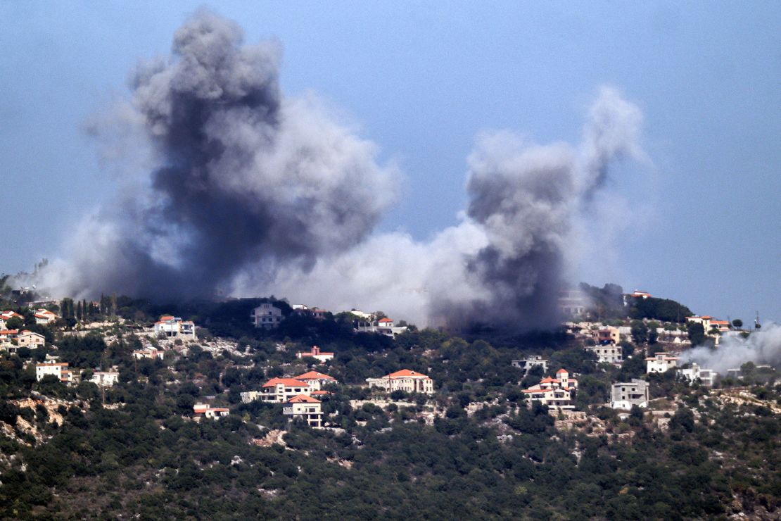 A cloud of smoke rises after an Israeli air strike on the village of Sajd.