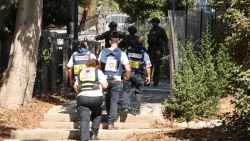 Israeli emergency responders cordon off the site of a rocket attack, fired from Lebanon, in Kibbutz Saar, north of Nahariya on September 25, 2024. (Photo by Jack GUEZ / AFP) (Photo by JACK GUEZ/AFP via Getty Images)