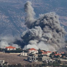 TOPSHOT - Smoke rises from the site of an Israeli airstrike that targeted the southern Lebanese village of Khiam on September 25, 2024. Lebanon said 23 people were killed and dozens injured in Israeli strikes across Lebanon September 25, the third day of major Israeli raids in the country as fighting with Hezbollah has intensified. (Photo by Rabih DAHER / AFP) (Photo by RABIH DAHER/AFP via Getty Images)