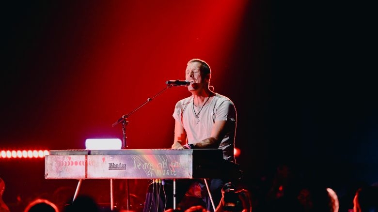LAS VEGAS, NEVADA - SEPTEMBER 21: Chris Martin of Coldplay performs onstage during the 2024 iHeartRadio Music Festival at T-Mobile Arena on September 21, 2024 in Las Vegas, Nevada. (Photo by Bryan Steffy/Getty Images)