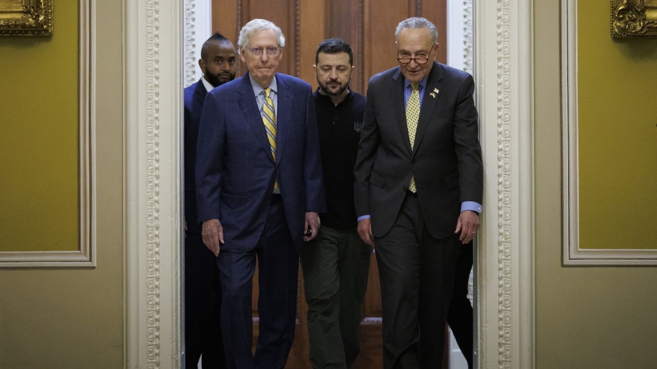 Ukrainian President Volodymyr Zelensky walks with Senate Majority Leader Chuck Schumer and Senate Minority Leader Mitch McConnell at the Capitol on Thursday.