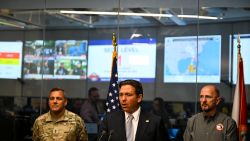 Florida Governor Ron DeSantis speaks during a press conference at the State Emergency Operations Center in Tallahassee, Florida, on September 26, 2024 as Hurricane Helene was set to slam into the Florida coast as a "catastrophic" Category 4 storm. An increasingly powerful hurricane threatening "catastrophic," dangerous storm surges and flooding was forecast to hit Florida's Gulf coast on September 26, as thousands of residents evacuated towns along the US state's shoreline. Helene strengthened into a hurricane mid-morning September 25 in the Gulf of Mexico and is "expected to bring life-threatening storm surge, damaging winds, and flooding rains to a large portion of Florida and the Southeastern United States," the National Hurricane Center in Miami said in its latest bulletin. (Photo by CHANDAN KHANNA / AFP) (Photo by CHANDAN KHANNA/AFP via Getty Images)