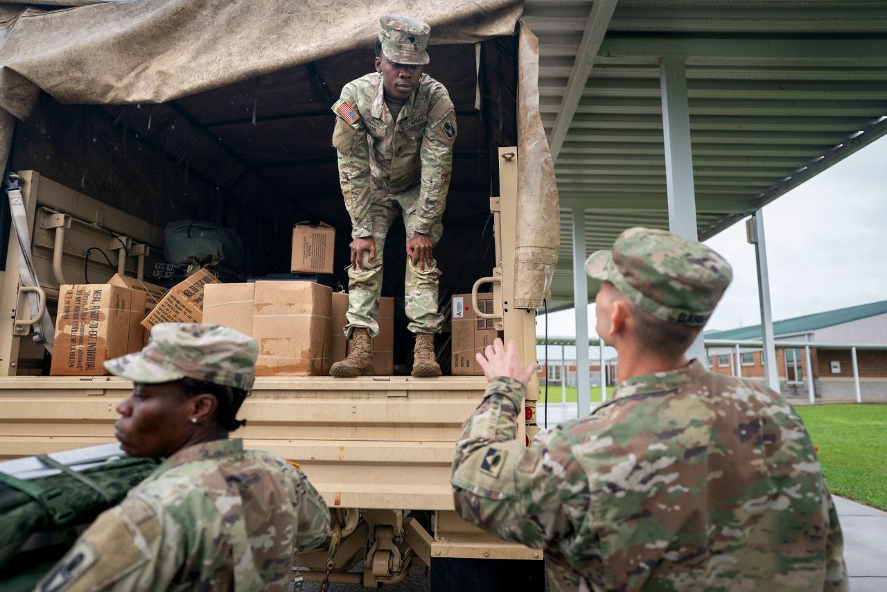 National Guardsman prepares a truck for storm response on Thursday in Crawfordville, Florida.