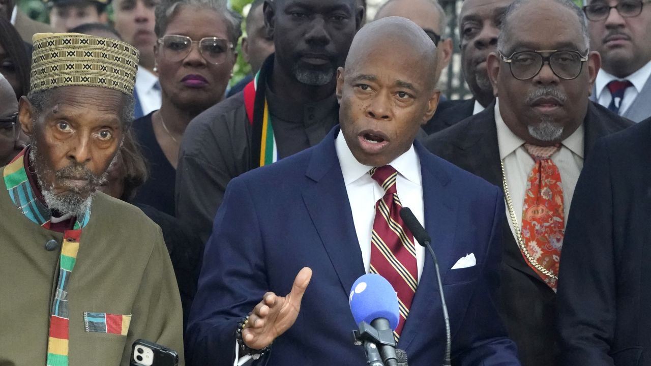 New York City Mayor Eric Adams talks to the press outside Gracie Mansion, the official residence of the mayor of New York City, on September 26, 2024, after he was indicted on federal criminal charges. US federal agents raided the official residence of Mayor Adams early September 26 ahead of the expected announcement of criminal charges against the former city cop once touted as a rising Democratic Party star. The search at the residence known as Gracie Mansion began before dawn, and is the latest shock twist in a graft investigation against the Adams istration. (Photo by TIMOTHY A. CLARY / AFP) (Photo by TIMOTHY A. CLARY/AFP via Getty Images)