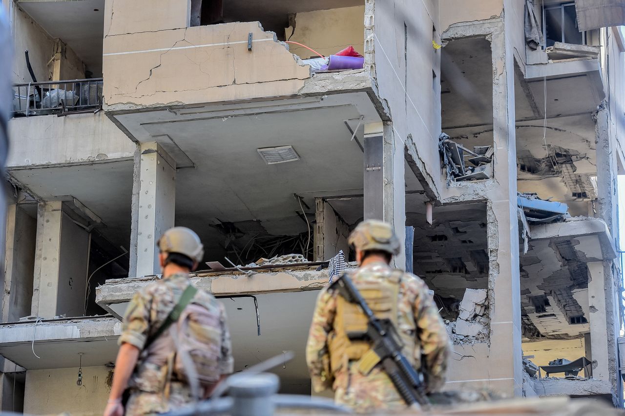 Lebanese soldiers stand guard at the site of an Israeli airstrike that targeted an apartment in Beirut's southern suburbs on September 26.