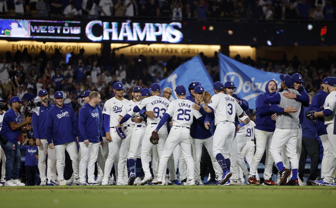 LA celebrates after beating the San Diego Padres 7-2 to win the NL West at Dodger Stadium.