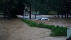 ATLANTA, GEORGIA - SEPTEMBER 27: A car is submerged in the floodwaters in the Buckhead neighborhood in the aftermath of Hurricane Helene on September 27, 2024 in Atlanta, Georgia. Hurricane Helene made landfall in Florida's Big Bend region as a category four hurricane, and has brought flooding inland as the storm system moves over Georgia, heading into the Carolinas. (Photo by Megan Varner/Getty Images)