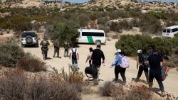 JACUMBA HOT SPRINGS, CALIFORNIA - SEPTEMBER 19: U.S. Border Patrol agents take asylum seekers into custody after they crossed a remote area of the U.S.-Mexico border on September 19, 2024 near Jacumba Hot Springs, California. Immigrant border crossings remain low months after the Biden Administration's executive order banning most asylum claims at the southern border. The issues of asylum and illegal immigration remain motivating topics for voters ahead of the upcoming U.S. election. (Photo by John Moore/Getty Images)