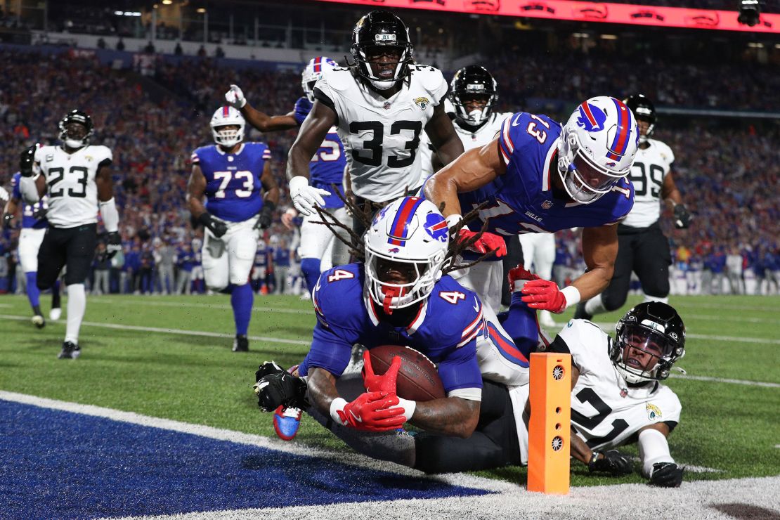 Cook runs the ball for a touchdown against the Jacksonville Jaguars in Orchard Park, New York, on September 23.