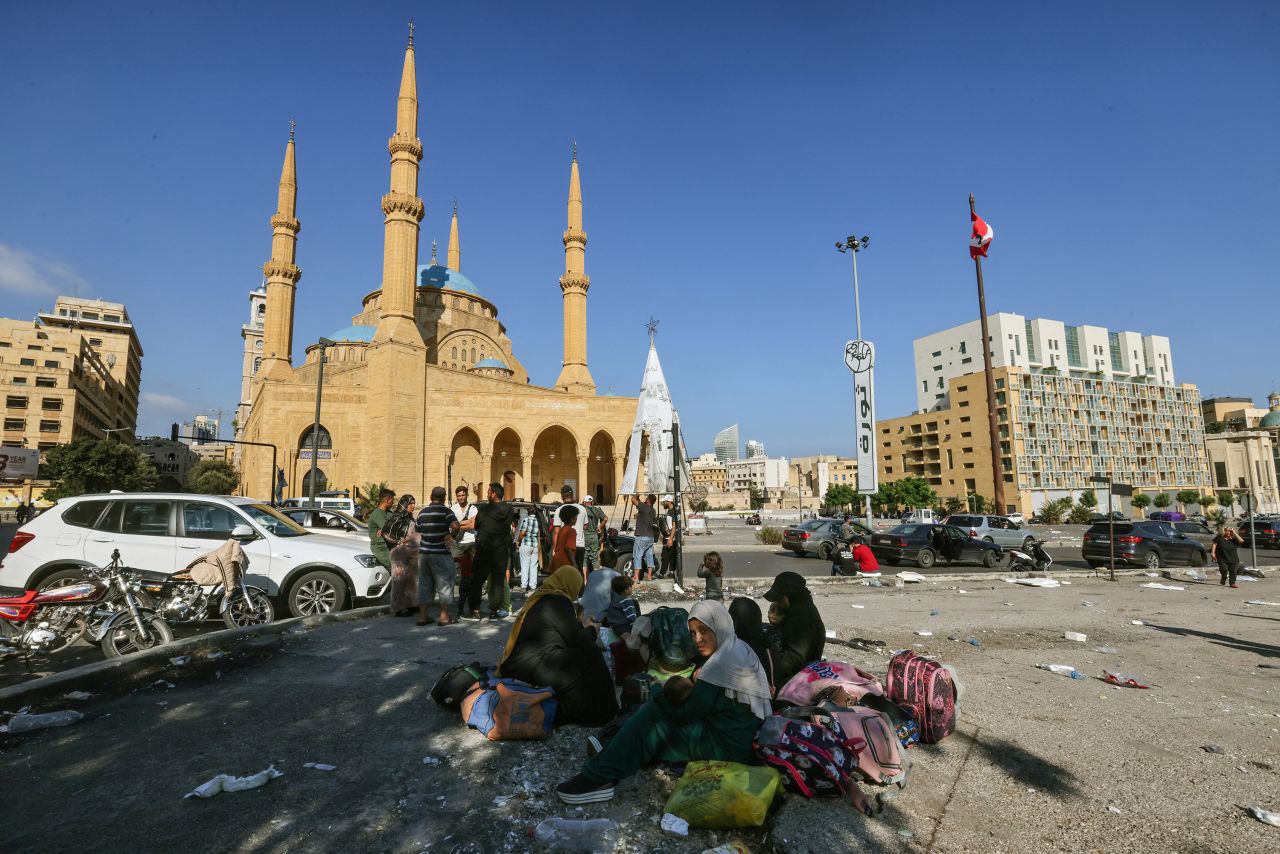 People who fled Israeli bombardment gather with some of their belongings in Beirut, Lebanon, on September 28.