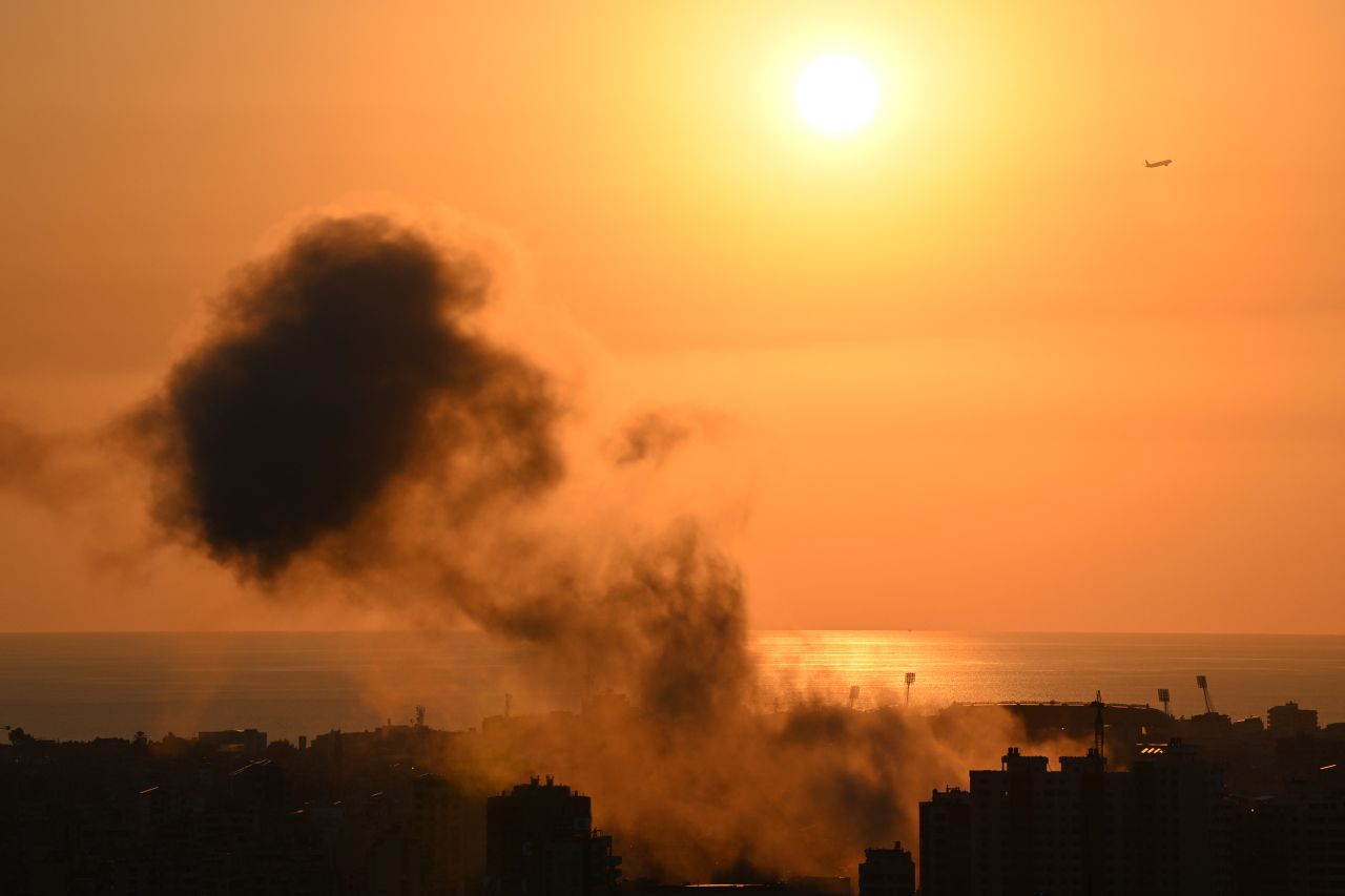 Smoke rises from the site of an Israeli airstrike on Beirut's southern suburbs on September 28.