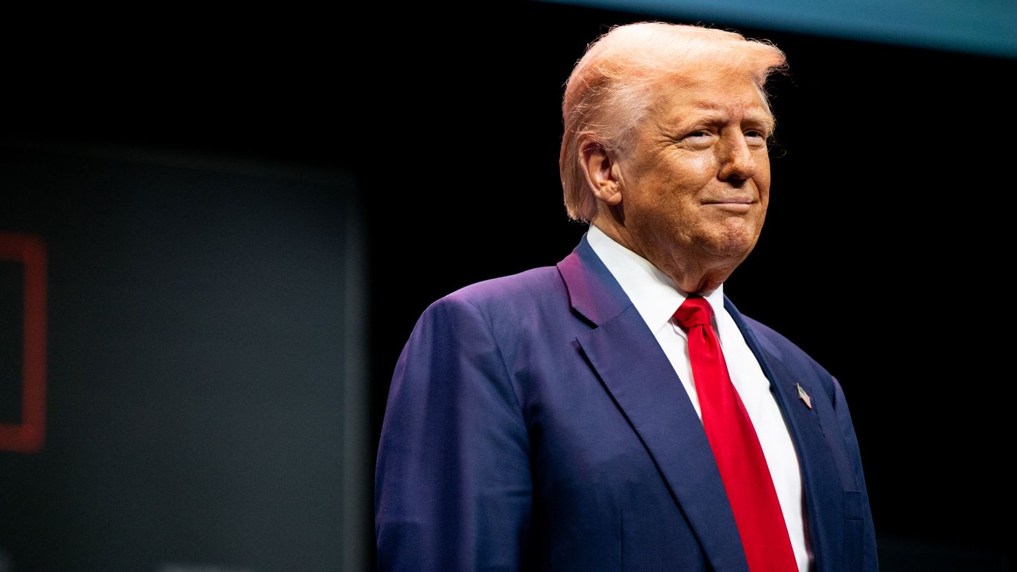 Former President Donald Trump arrives during a campaign rally at the Johnny Mercer Theatre on September 24, 2024, in Savannah, Georgia.