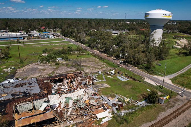 Buildings are left damaged by the storm in Valdosta, Georgia, on Saturday.