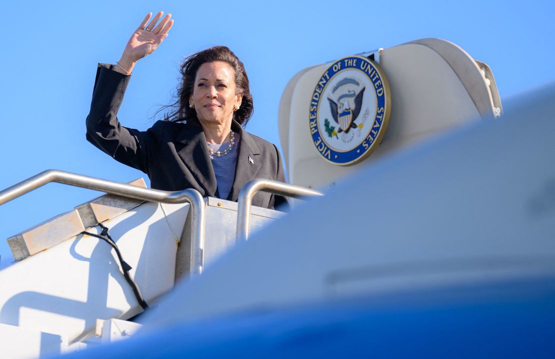 Kamala Harris waves as she boards Air Force Two departing San Francisco International Airport on September 28, 2024.