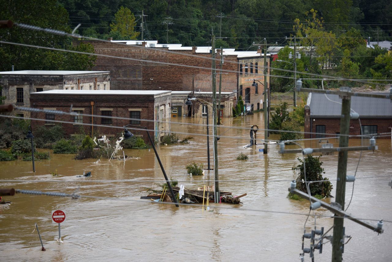 The streets of Asheville, North Carolina, are seen flooded on Saturday.