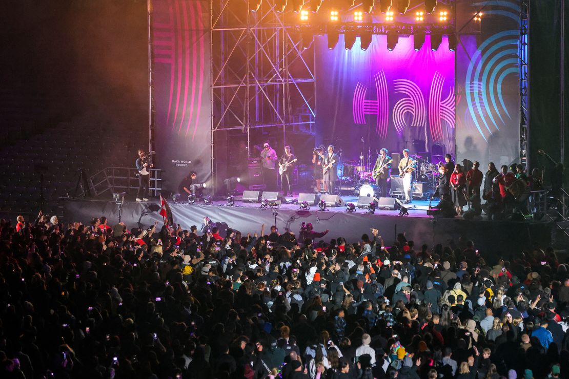 New Zealand band Six60 perform for participants gathered in a world record attempt for the largest mass Haka at Eden Park in Auckland on September 29, 2024.