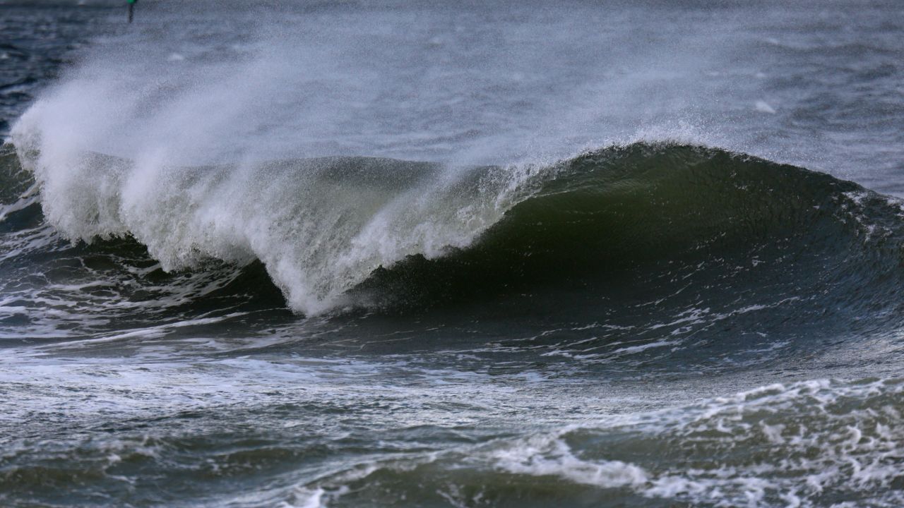 The Gulf of Mexico water pushes up against the shore as Hurricane Helene builds offshore at St. Pete Beach, Florida, on September 26.