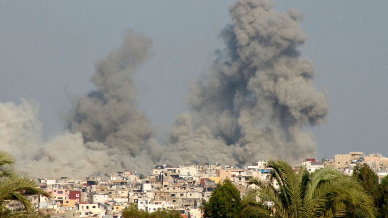 TOPSHOT - Smoke billows after an Israeli strike on a village near the southern Lebanese city of Tyre on September 29, 2024. (Photo by Kawnat HAJU / AFP) (Photo by KAWNAT HAJU/AFP via Getty Images)