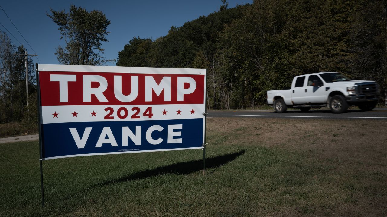 A campaign sign in support of former President Donald Trump and Sen. JD Vance is seen along a rural highway near Kingsley, Michigan, on September 26.