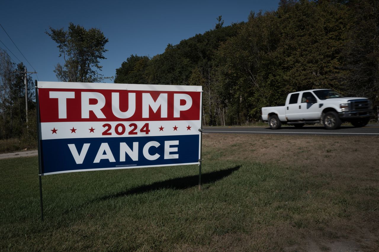 A campaign sign in support of former President Donald Trump and Sen. JD Vance is seen along a rural highway near Kingsley, Michigan, on September 26.