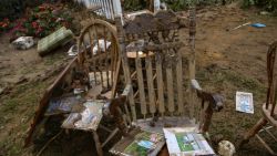 OLD FORT, NORTH CAROLINA - SEPTEMBER 29: Keep sakes belonging to Terry Wilson lay outside his mother's home in the aftermath of Hurricane Helene on September 29, 2024 in Old Fort, North Carolina. Wilson said their beloved dog's ashes were found after the flooding. According to reports, more than 60 people have been killed across the South due to the storm, and millions have been left without power. North Carolina has been approved for a Federal Major Disaster Declaration. (Photo by Melissa Sue Gerrits/Getty Images)