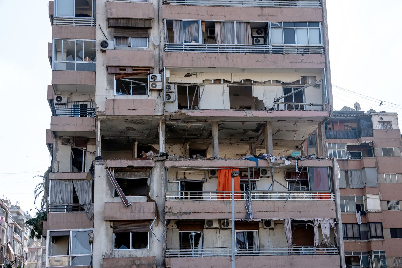 An apartment blocks stands in partial ruins after being hit by an Israeli airstrike on September 30, in Beirut, Lebanon.