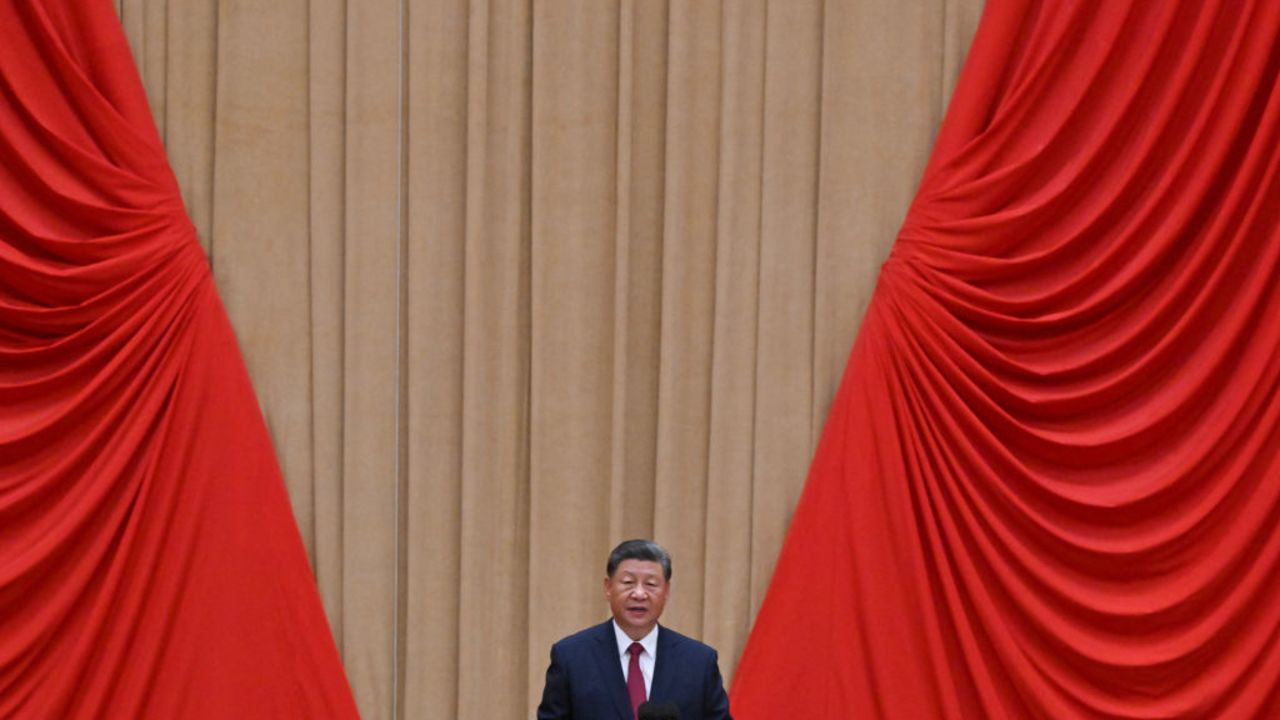 China's President Xi Jinping speaks at the podium during a reception on the eve of National Day at the Great Hall of the People in Beijing on September 30, 2024. (Photo by ADEK BERRY / AFP) (Photo by ADEK BERRY/AFP via Getty Images)