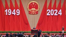 China's President Xi Jinping speaks during a National Day reception on the eve of the 75th anniversary of the People's Republic of China, at the Great Hall of the People in Beijing on September 30, 2024.