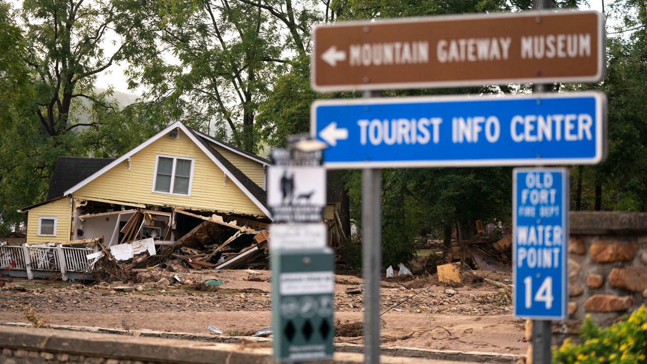 OLD FORT, NORTH CAROLINA - SEPTEMBER 30: A storm damaged house sits in ruins near a sign for the Mountain Gateway Museum in the aftermath of Hurricane Helene on September 30, 2024 in Old Fort, North Carolina. According to reports, at least 90 people have been killed across the southeastern U.S., and millions are without power due to the storm, which made landfall as a Category 4 hurricane on Thursday. The White House has approved disaster declarations in North Carolina, Florida, South Carolina, Tennessee, Georgia, Virginia and Alabama, freeing up federal emergency management money and resources for those states. (Photo by Sean Rayford/Getty Images)