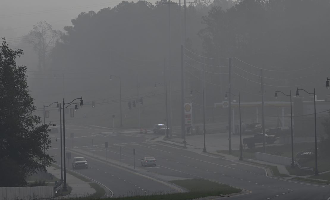 One day after the chemical plant fire, a dark haze smothers parts of Conyers, Georgia.