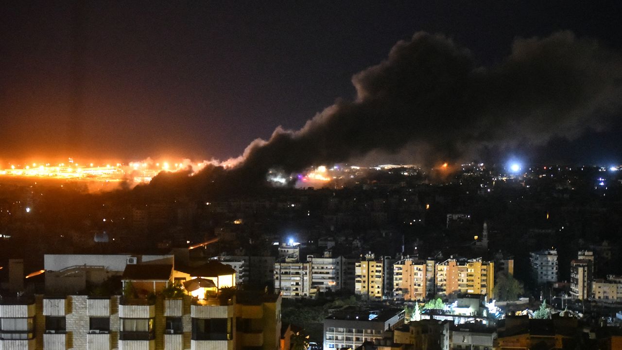 Smoke rises from the site of an Israeli airstrike that targeted a neighbourhood in Beirut's southern suburb early on October 1.