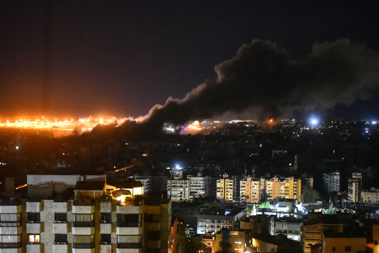 Smoke rises from the site of an Israeli airstrike that targeted a neighbourhood in Beirut's southern suburb early on October 1.