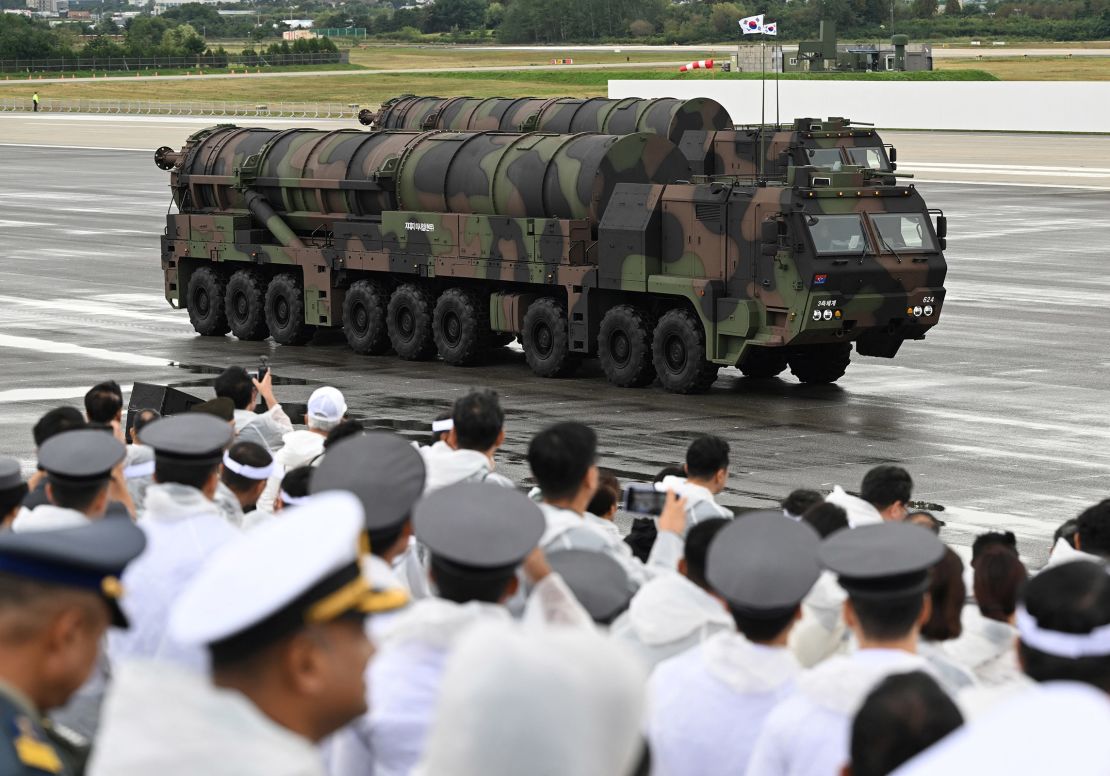 Visitors watch South Korea's Hyunmoo-5 missile during a ceremony to mark the 76th anniversary of Korea Armed Forces Day at Seoul Air Base in Seongnam on October 1, 2024.