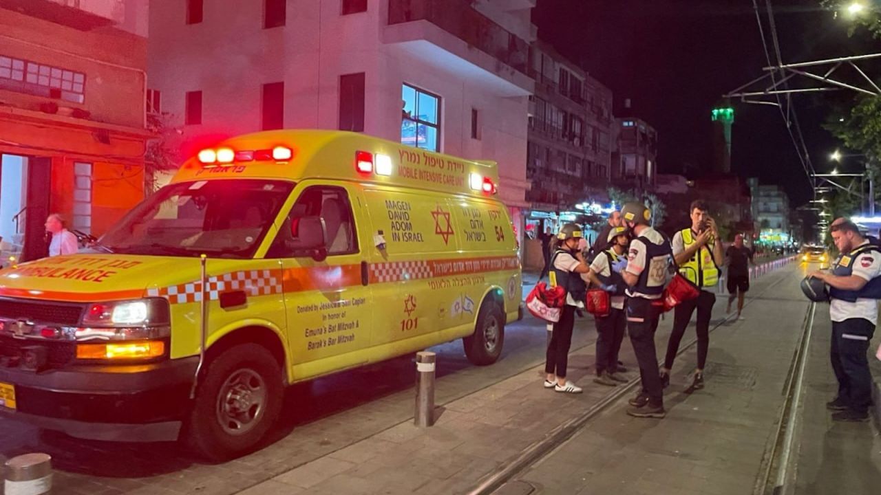 Medics are deployed to the scene after armed attack in Jaffa, Tel Aviv on Monday.