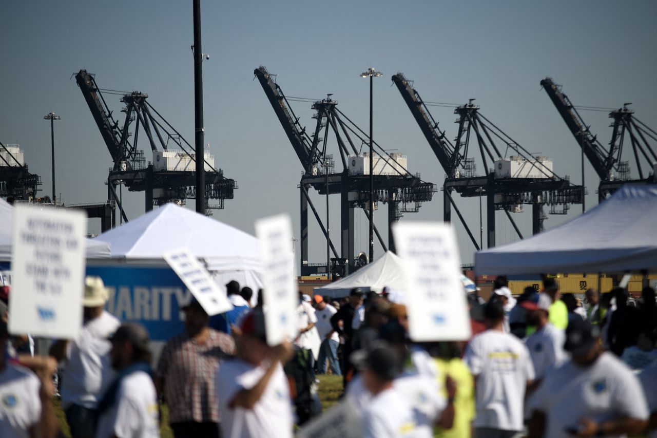 Dockworkers strike at the Bayport Container Terminal in Seabrook, Texas, on October 1.