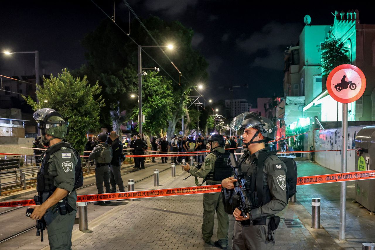 Israeli border guards deploy at the scene of a shooting attack outside al-Nuzha mosque along Jersalem Boulevard in Jaffa south of Tel Aviv on October 1.