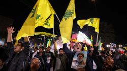 Iranians celebrate at Palestine Square in Tehran following Iran's air attack on Israel, on October 1, 2024. Iran's Revolutionary Guards said a missile attack under way against Israel on October 1 was in response to the killing of Hezbollah chief Hassan Nasrallah last week as well as that of the Hamas leader. (Photo by ATTA KENARE / AFP) (Photo by ATTA KENARE/AFP via Getty Images)