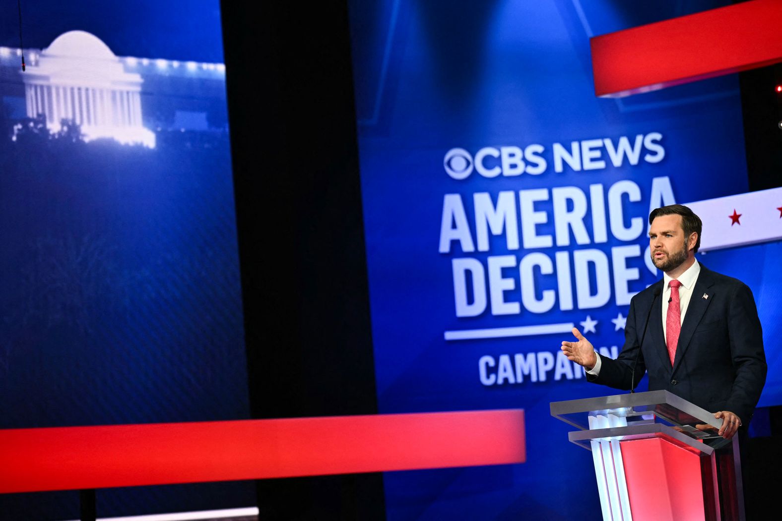 Vance delivers remarks during the debate.