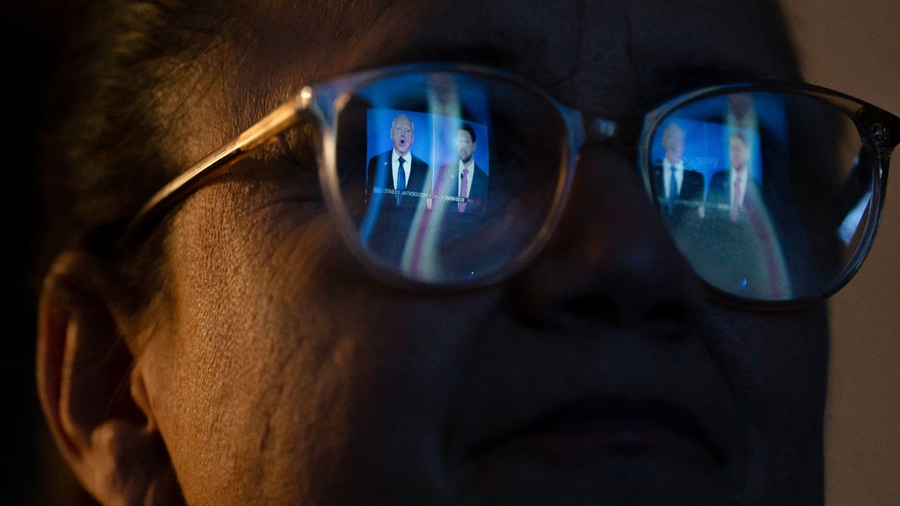 A woman attends a watch party at Arizona GOP headquarters for the vice presidential debate between JD Vance and Tim Walz in Phoenix, Arizona, on October 1.