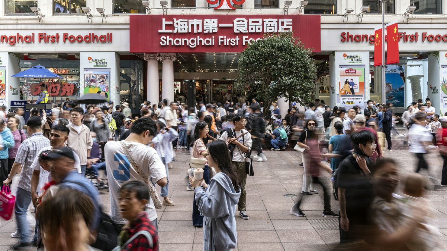 Shoppers on Nanjing East Road in Shanghai, China, on October 2, 2024.