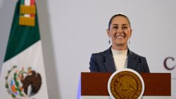 Mexico's President Claudia Sheinbaum looks on during her first morning conference at the National Palace in Mexico City on October 2, 2024. Claudia Sheinbaum was sworn in Tuesday as Mexico's first woman president, inheriting a country beset by gang violence and economic uncertainty over controversial reforms passed by her powerful ruling party. (Photo by Alfredo ESTRELLA / AFP) (Photo by ALFREDO ESTRELLA/AFP via Getty Images)