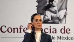 Mexico's President Claudia Sheinbaum gestures during her first morning conference at the National Palace in Mexico City on October 2, 2024. Claudia Sheinbaum was sworn in Tuesday as Mexico's first woman president, inheriting a country beset by gang violence and economic uncertainty over controversial reforms passed by her powerful ruling party. (Photo by Alfredo ESTRELLA / AFP) (Photo by ALFREDO ESTRELLA/AFP via Getty Images)