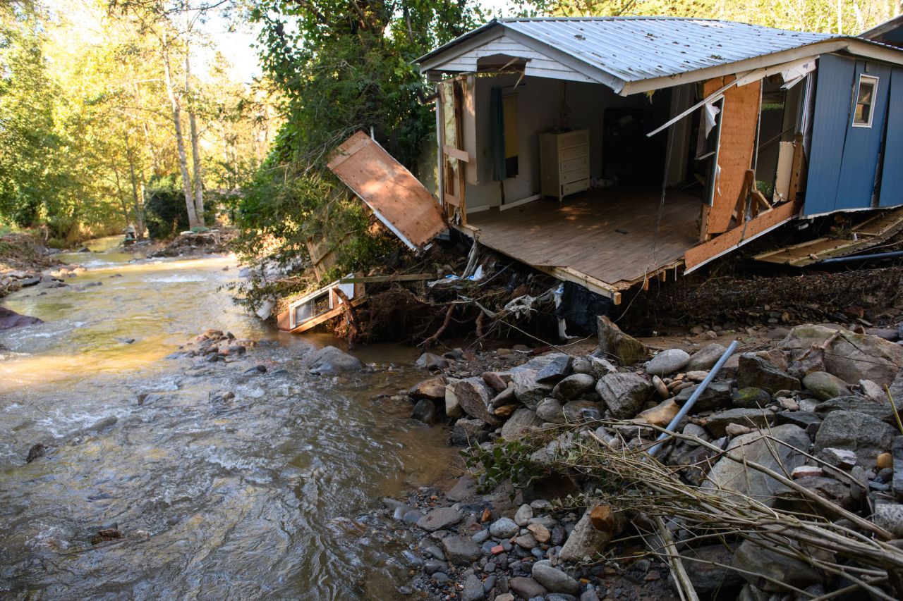 A damaged home is seen in Black Mountain, North Carolina.