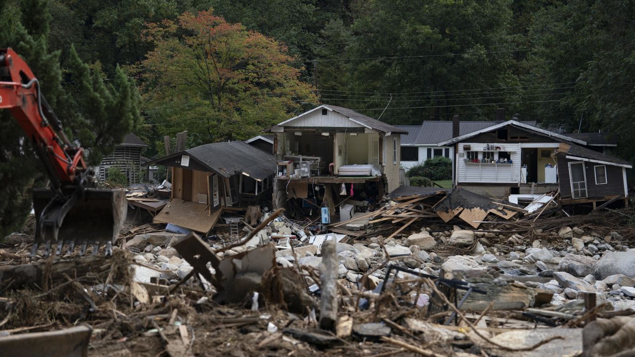 TOPSHOT - Damaged structures are seen in downtown Chimney Rock, North Carolina, October 2, 2024, after the age of Hurricane Helene. The death toll from powerful storm Helene, which battered the southeastern United States, has climbed to more than 155, authorities said on October 1, as President Joe Biden and Vice President Kamala Harris surveyed the damage. (Photo by Allison Joyce / AFP) (Photo by ALLISON JOYCE/AFP via Getty Images)