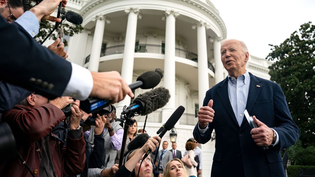 President Joe Biden speaks to the press as he prepares to board Marine One on the South Lawn of the White House on October 3, in Washington, D.C.